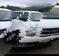 IMAX Private Transfer 7 Guests Cairns Airport to Palm Cove - Accommodation Sunshine Coast