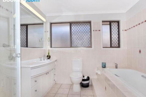 Schirrmann 56 Four Bedroom Home On Canal With Pool Pontoon Aircon & WiFi! - Accommodation Sunshine Coast 0