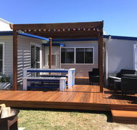 Shellharbour Beach Cottage - walk onto Patrolled beach with flags in summer - Accommodation Sunshine Coast